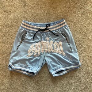 Blue Athletic Shorts with White Accents